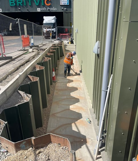 Excavation and drainage works alongside the production building
