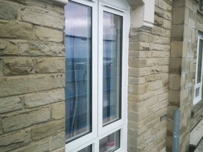 New windows in the stonework of the building