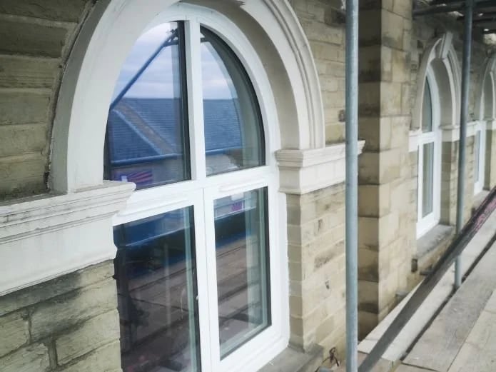 Detail of the arched window head after replacement