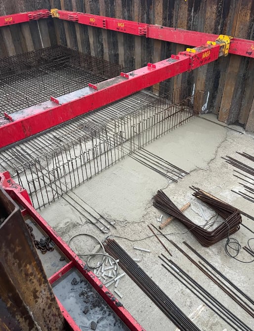 A 5m deep cofferdam with propping and a cast concrete slab