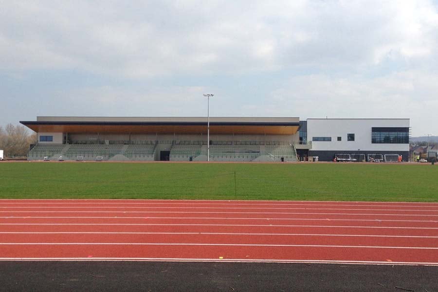 The sports village building alongside the running track
